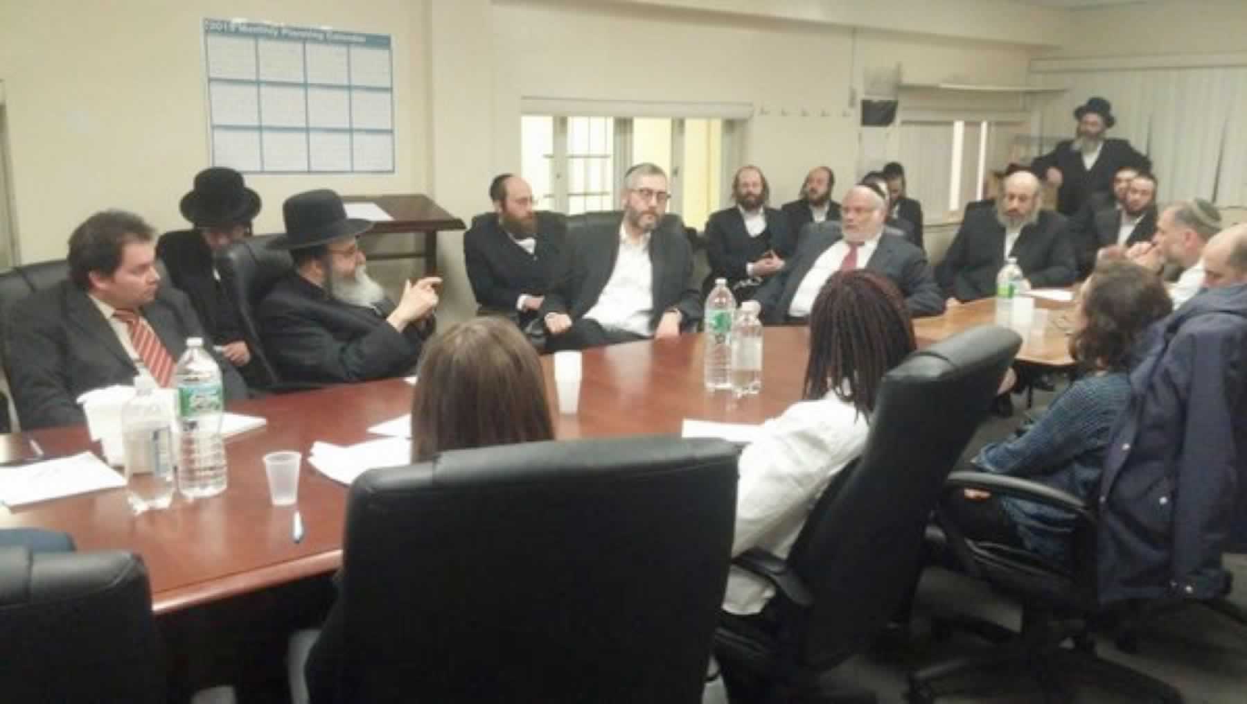 Meeting with the NYC Department of Health to respond to a chicken pox outbreak in Williamsburg.